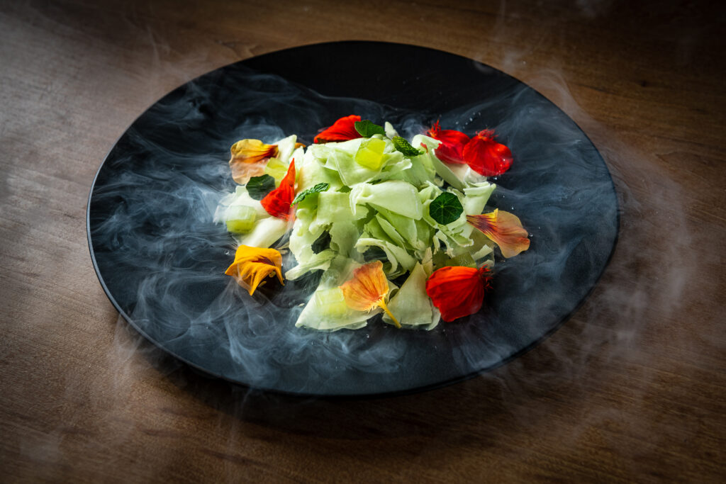 smoke emanating from a frozen salad on a dish