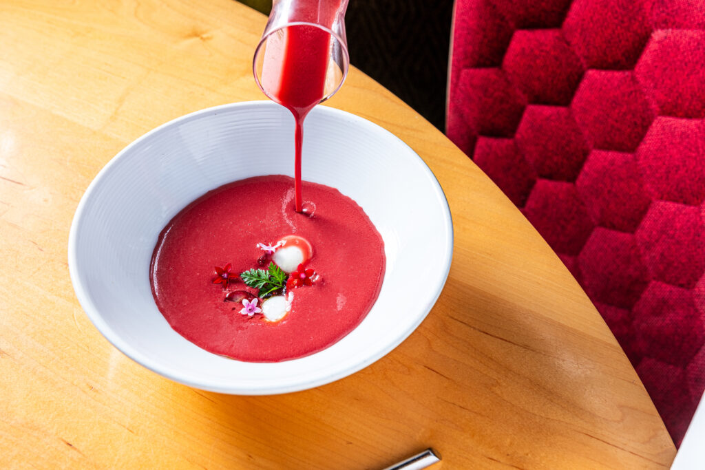 bowl of gazpacho on a table.